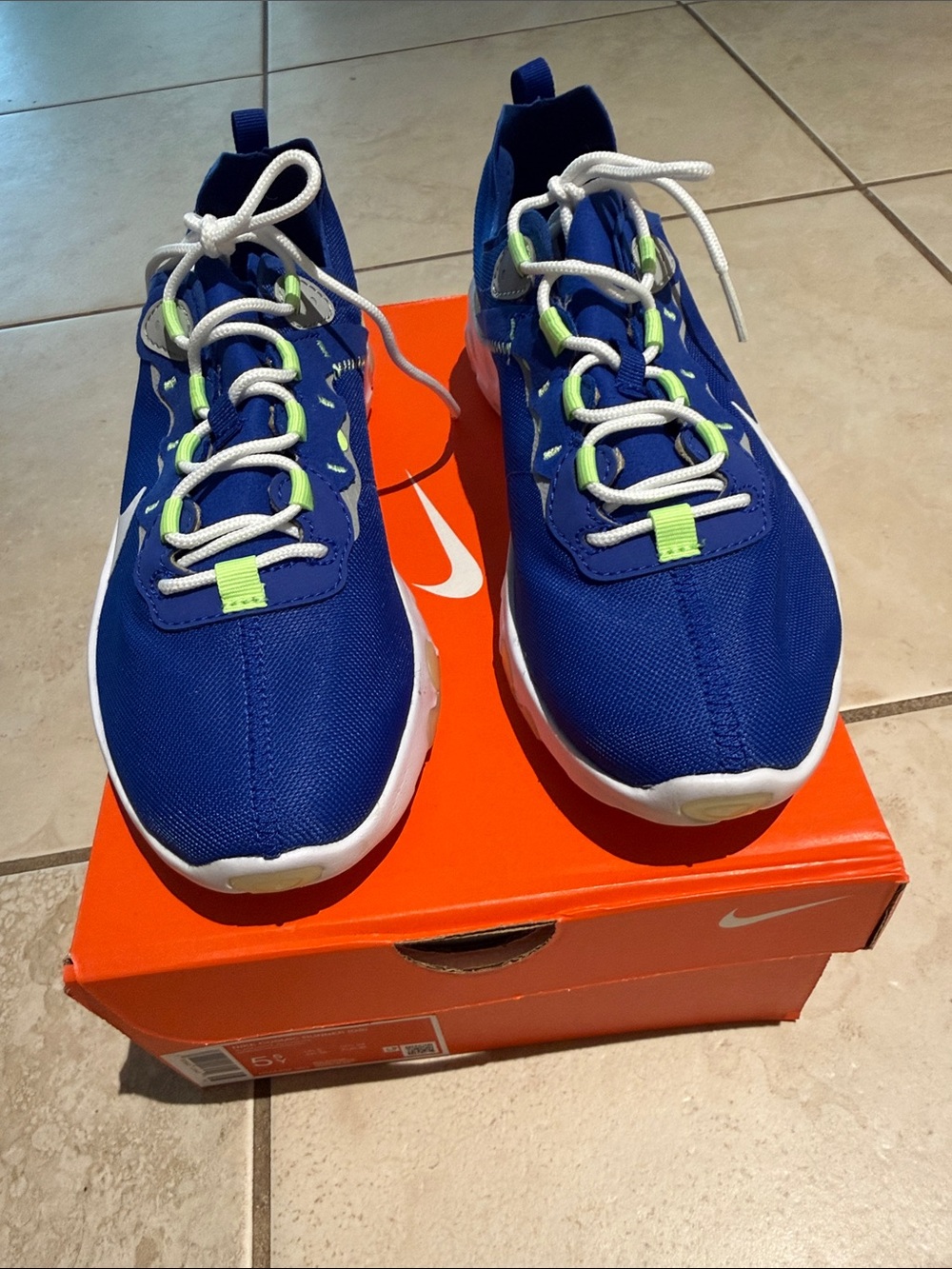 New in box Nike Kids Royal Blue Sneakers with Neon Green Accents size 5.5